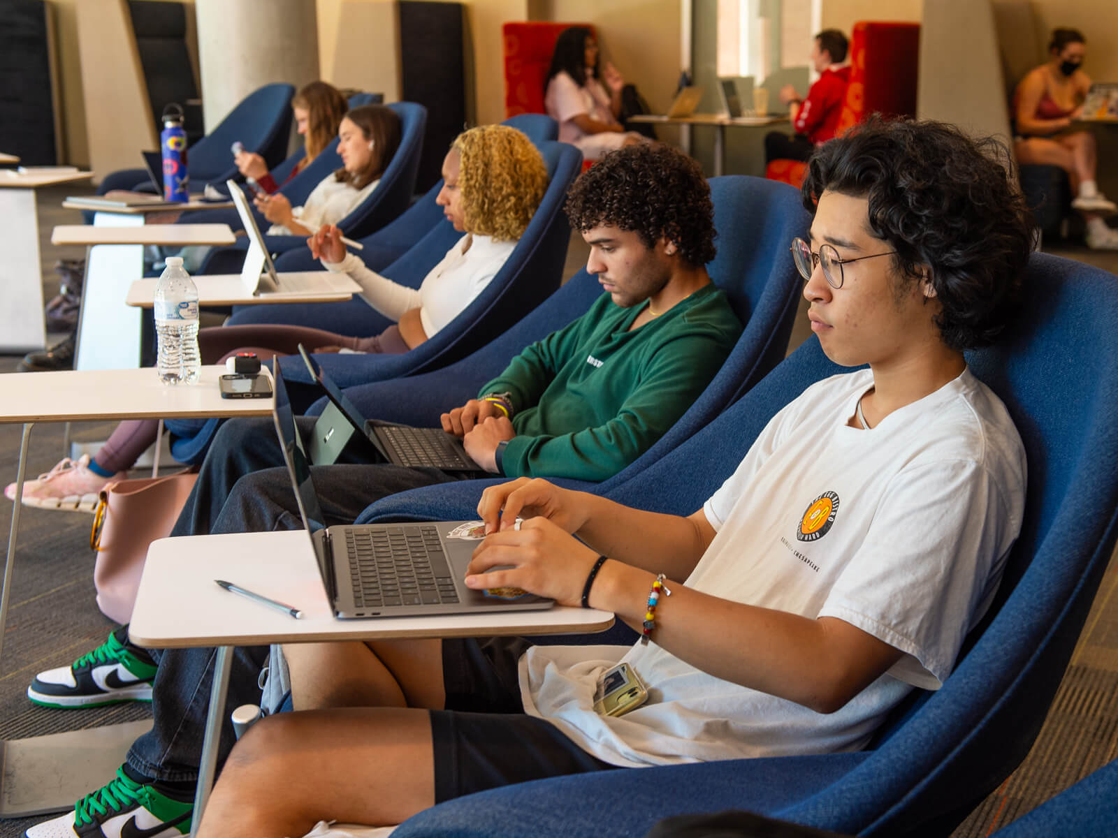 Group of students using computers at VCU.