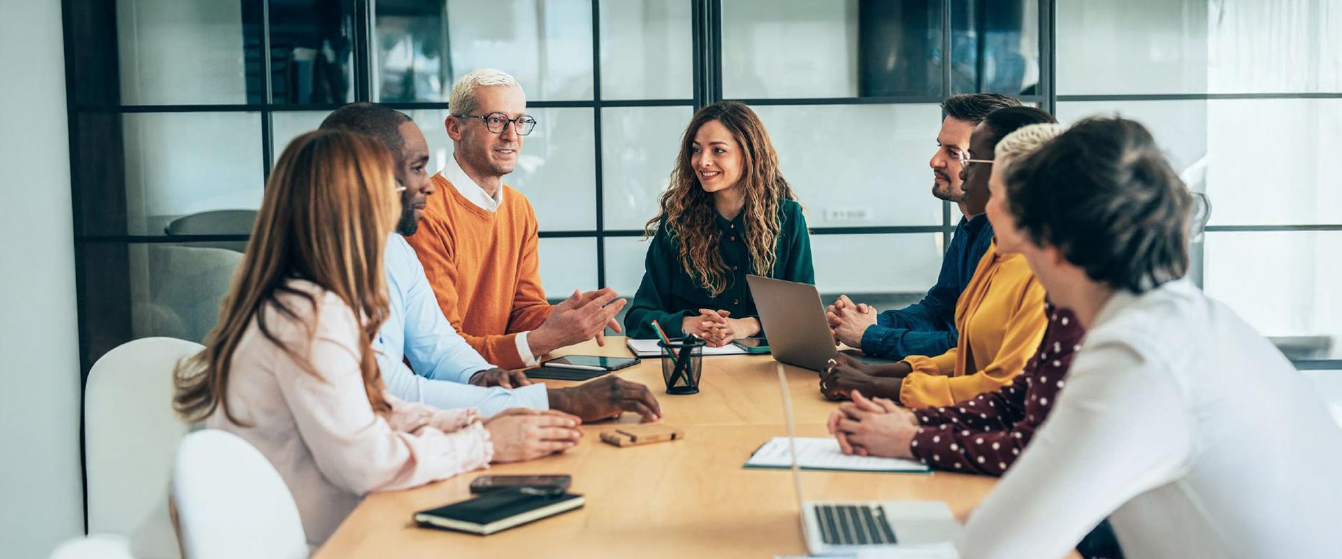 A group of healthcare team members meet to discuss neurodevelopmental issues