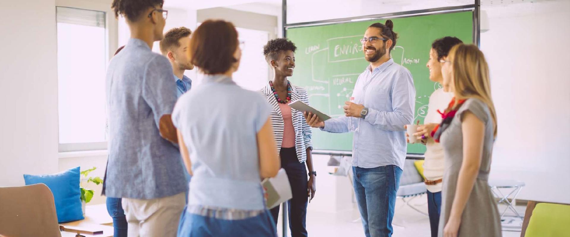 A group of transformative leaders who are in a group discussion