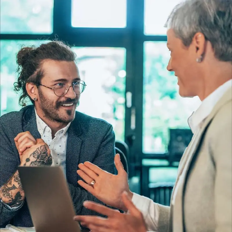 A manager having a conversation with a business colleague
