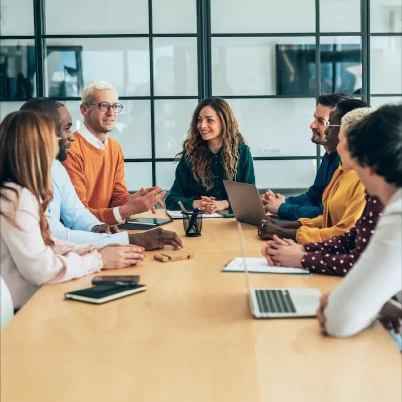 A group of healthcare team members meet to discuss neurodevelopmental issues